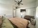 Serene main bedroom with seating area, lots of closet space, and neutral tones at 529 Regal Robin Way, North Las Vegas, NV 89084