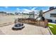 View of backyard with trampoline, RV parking, brick perimeter wall, and an outdoor lawn at 5876 Tippin Dr, Las Vegas, NV 89130