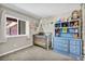 Bedroom featuring a gray crib, and blue dresser at 5876 Tippin Dr, Las Vegas, NV 89130