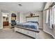 Cozy bedroom with neutral colors and en-suite bathroom at 5876 Tippin Dr, Las Vegas, NV 89130
