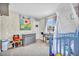 Bright bedroom with a grey dresser, an airy canopy, and window views at 5876 Tippin Dr, Las Vegas, NV 89130