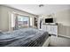 Bedroom featuring a bay window with exterior view and a dresser at 5876 Tippin Dr, Las Vegas, NV 89130