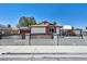 Charming single-story home with gated side yard provides extra secure parking at 5876 Tippin Dr, Las Vegas, NV 89130