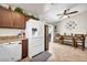 Clean kitchen with stainless steel appliances and a view to the dining area and backyard at 5876 Tippin Dr, Las Vegas, NV 89130