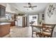 Eat-in kitchen with stainless steel appliances and direct access to backyard sliding glass door at 5876 Tippin Dr, Las Vegas, NV 89130