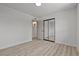 Bedroom with sliding closet doors at 6229 Cromwell Ave, Las Vegas, NV 89107