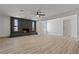 Cozy living room features fireplace, wood floors, and open layout at 6229 Cromwell Ave, Las Vegas, NV 89107