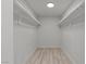 Empty walk-in closet with new shelving at 6229 Cromwell Ave, Las Vegas, NV 89107