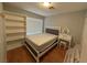 Comfortable bedroom with shelving, vanity and natural light at 6700 Oak Valley Dr, Las Vegas, NV 89103