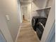 Convenient laundry room with modern washer and dryer units at 6700 Oak Valley Dr, Las Vegas, NV 89103