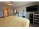 Spacious main bedroom with a large bed, wall-mounted TV, and walk-in closet at 6700 Oak Valley Dr, Las Vegas, NV 89103