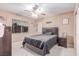 Standard bedroom with carpet, natural light, ceiling fan and simple decor at 6954 Jacksboro Ct, North Las Vegas, NV 89084