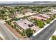 Aerial view showcasing a private backyard with a pool, spa, and well-manicured landscaping in a residential neighborhood at 7111 Bath Dr, Las Vegas, NV 89131