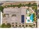 Stunning aerial view of a modern home featuring a private pool, solar panels, and beautifully landscaped backyard oasis at 7111 Bath Dr, Las Vegas, NV 89131
