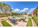 Beautiful backyard with swimming pool, fire pit and lounge area, perfect for outdoor entertaining at 7111 Bath Dr, Las Vegas, NV 89131