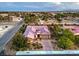 Charming single-Gathering home with manicured front yard, brick driveway, and welcoming entrance, set in a suburban neighborhood at 7111 Bath Dr, Las Vegas, NV 89131