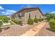Home exterior with desert landscaping and stucco siding at 7111 Bath Dr, Las Vegas, NV 89131