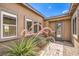 Welcoming entrance with a decorative front door and brick pathway at 7111 Bath Dr, Las Vegas, NV 89131