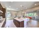 Spacious kitchen island with seating offers ample counter space, blending seamlessly with living space at 7111 Bath Dr, Las Vegas, NV 89131