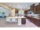 Bright kitchen with large island, ample counter space, and seamless integration with the adjacent living area at 7111 Bath Dr, Las Vegas, NV 89131