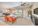 Airy living space featuring an open layout, dining area, and ample seating at 7111 Bath Dr, Las Vegas, NV 89131