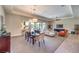 Bright living room with large sliding doors and comfortable seating at 7111 Bath Dr, Las Vegas, NV 89131