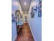 Hallway with wood floors leading to other areas of the home at 7225 Millerbird St, North Las Vegas, NV 89084