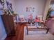 Relaxing living room with plush armchairs, coffee table, and decorative mirrors at 7225 Millerbird St, North Las Vegas, NV 89084