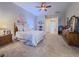 Spacious main bedroom with ensuite and carpeted floors at 7225 Millerbird St, North Las Vegas, NV 89084
