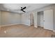 Comfortable bedroom with a ceiling fan, closet, and modern flooring providing a serene retreat at 7761 Cowboy Trl, Las Vegas, NV 89131
