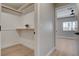 Walk in closet with shelves and rod, with access to another bedroom at 7761 Cowboy Trl, Las Vegas, NV 89131