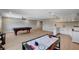 Spacious game room features a pool table, air hockey, and custom bar area at 7761 Cowboy Trl, Las Vegas, NV 89131