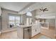Bright and airy kitchen with a large island, farmhouse sink, and stylish finishes at 7761 Cowboy Trl, Las Vegas, NV 89131