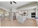 Spacious kitchen with stainless steel appliances, a central island, and ample counter space at 7761 Cowboy Trl, Las Vegas, NV 89131