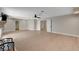 Large living room boasts hardwood floors, a fireplace, and easy access to other rooms at 7761 Cowboy Trl, Las Vegas, NV 89131