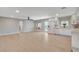 Bright living room featuring hardwood floors, recessed lighting, and large windows at 7761 Cowboy Trl, Las Vegas, NV 89131