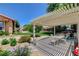 A shaded patio provides a relaxing outdoor space at 7761 Cowboy Trl, Las Vegas, NV 89131