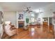 Spacious living room with hardwood floors, fireplace, and wet bar is perfect for entertaining and relaxation at 8428 Apple Hill Ct, Las Vegas, NV 89128