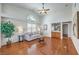 Cozy living room featuring hardwood floors, vaulted ceiling, and stylish decor at 8428 Apple Hill Ct, Las Vegas, NV 89128