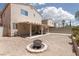 Home showcasing backyard with covered patio and easy landscaping at 9029 Tumblewood Ave, Las Vegas, NV 89143