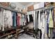 Walk-in closet with ample shelving and hanging space for clothes and shoes at 9029 Tumblewood Ave, Las Vegas, NV 89143