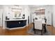 Open floor plan with dining area adjacent to kitchen with modern lighting fixtures at 9029 Tumblewood Ave, Las Vegas, NV 89143
