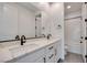Bathroom with double sinks, tile floor, and subway tile surround shower at 9265 Frazer St, Las Vegas, NV 89166