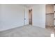Bedroom with white walls, carpeted floor, and a closet at 9265 Frazer St, Las Vegas, NV 89166