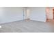 Spacious bedroom features neutral walls and carpet, offering a blank canvas for personalization at 9265 Frazer St, Las Vegas, NV 89166
