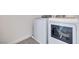 Modern laundry room with a new washer and dryer at 9265 Frazer St, Las Vegas, NV 89166