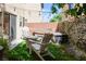 Inviting backyard with green artificial turf, a hammock, and string lights, perfect for relaxing and enjoying the outdoors at 9613 Eland Ct, Las Vegas, NV 89149
