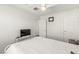 Spacious bedroom featuring a ceiling fan and ample natural light at 9613 Eland Ct, Las Vegas, NV 89149