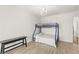 Minimalist bedroom featuring a bunk bed and a chandelier light fixture at 9613 Eland Ct, Las Vegas, NV 89149