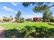 Green community park offers open space, mature landscaping, and a sense of community for residents to enjoy at 9613 Eland Ct, Las Vegas, NV 89149